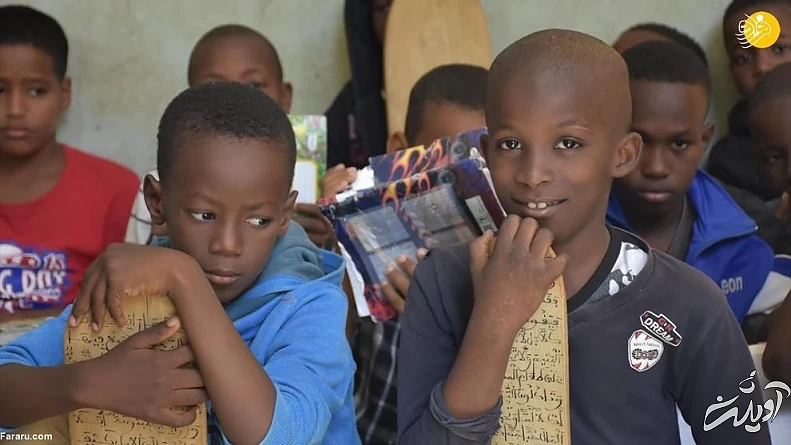 (تصاویر) کودکانی که با تخته چوبی حافظ قرآن می&zwnj;شوند